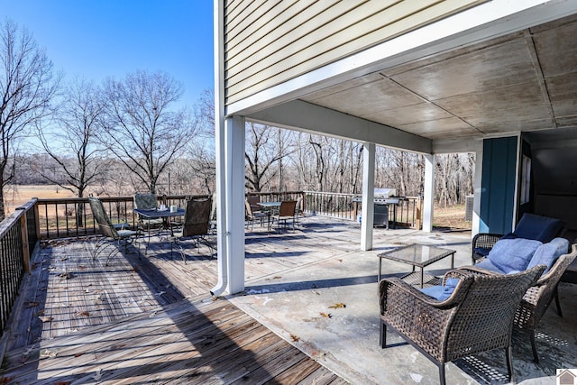 wooden terrace with area for grilling