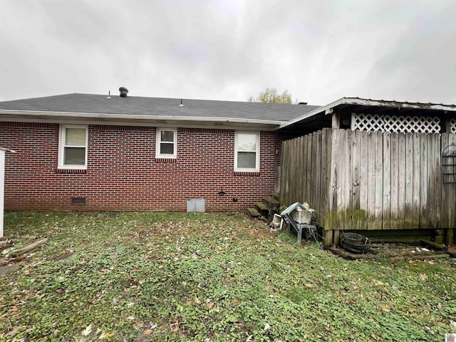 view of home's exterior featuring a lawn