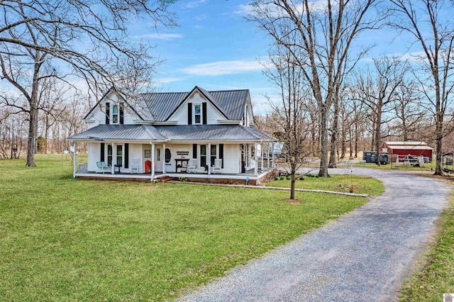 farmhouse-style home with a porch and a front yard