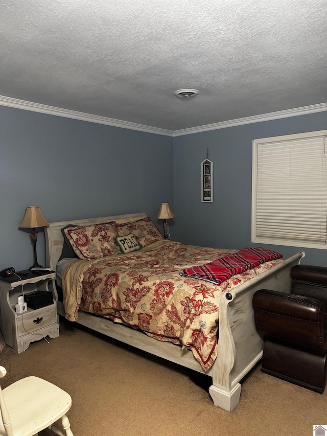 bedroom featuring carpet floors, a textured ceiling, and ornamental molding