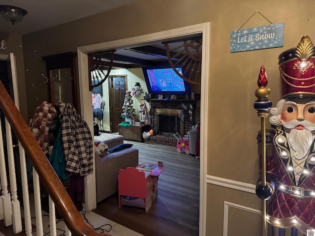 interior space featuring a fireplace and hardwood / wood-style flooring