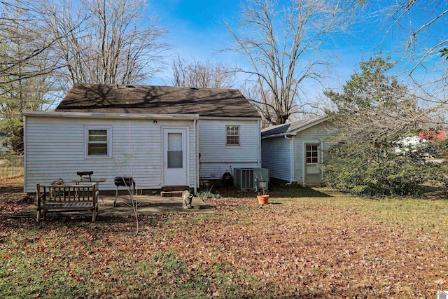 back of house with a patio and central air condition unit