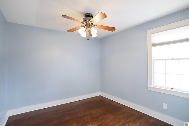 empty room featuring hardwood / wood-style floors and ceiling fan