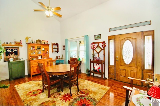 dining area featuring dark hardwood / wood-style floors, ceiling fan, and a healthy amount of sunlight