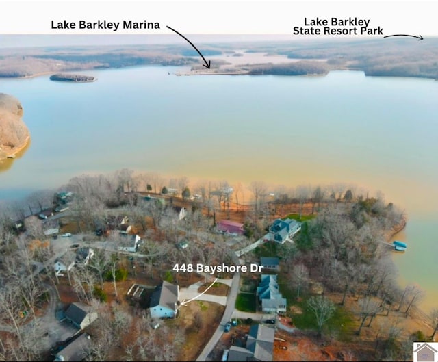 aerial view at dusk with a water view