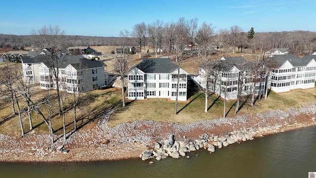 bird's eye view with a water view