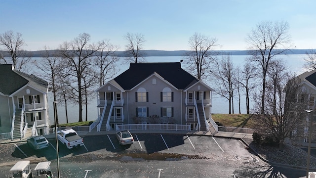 view of front of house featuring a water view