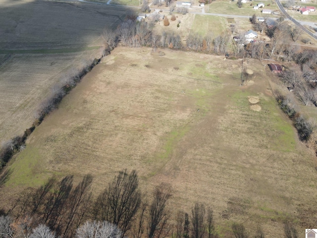 birds eye view of property featuring a rural view