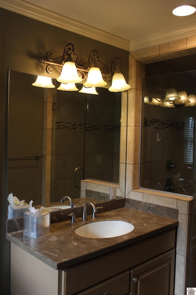 bathroom with vanity and ornamental molding