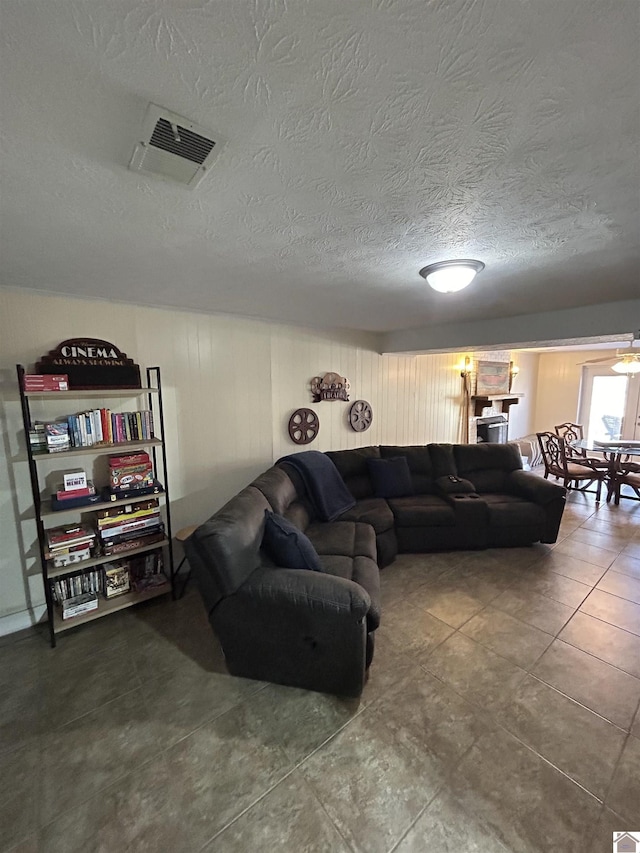 living room with a textured ceiling