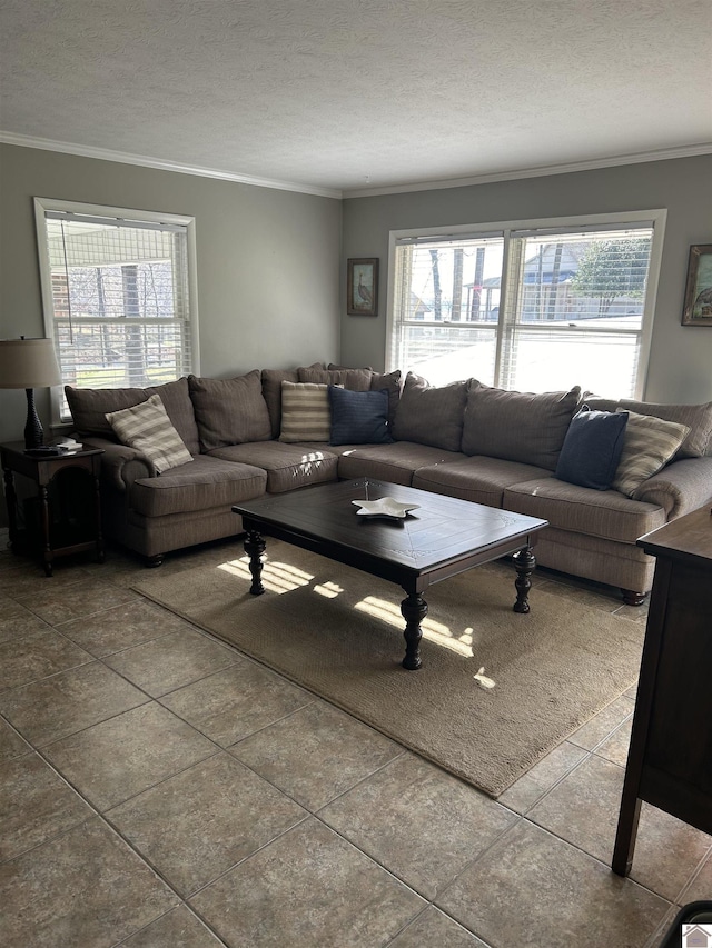 tiled living room featuring crown molding, plenty of natural light, and a textured ceiling