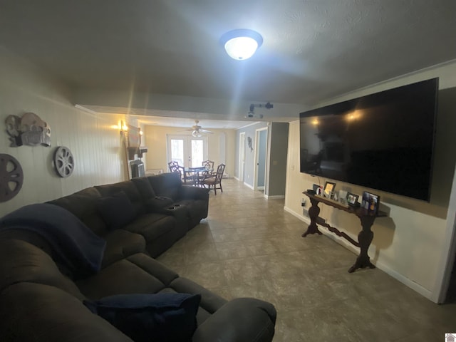 living room featuring ceiling fan