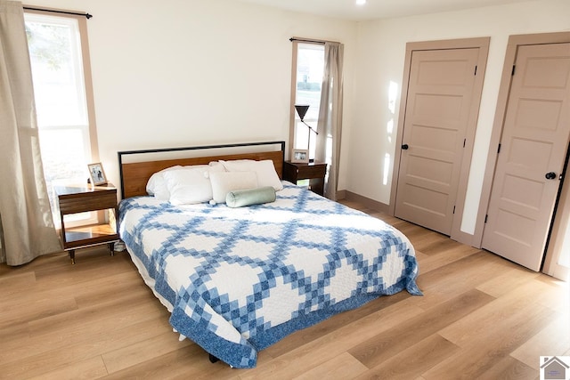 bedroom featuring light hardwood / wood-style floors