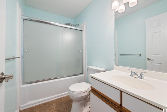 full bathroom with shower / bath combination with glass door, vanity, and toilet