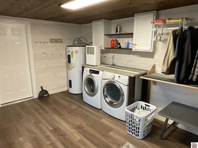 washroom with cabinets, wood ceiling, water heater, washer and dryer, and hardwood / wood-style floors