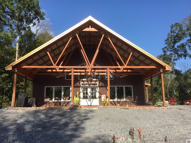 view of front facade with a patio area and ceiling fan