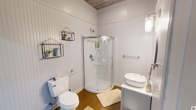 bathroom with vanity, toilet, and walk in shower