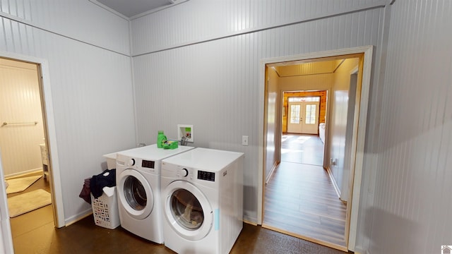 laundry room with washer and dryer and french doors