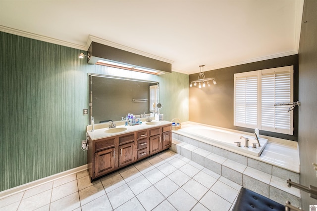 bathroom featuring tile patterned flooring, vanity, tiled bath, and ornamental molding