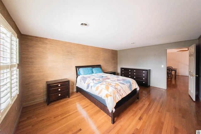 bedroom featuring wood-type flooring