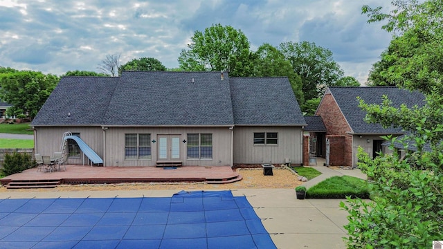 1521 Bellemeade Dr, Mayfield, KY 42066 - rear view of house with french doors, a wooden deck, a shingled roof, and a patio