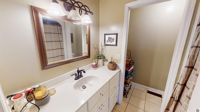 bathroom with vanity and tile patterned floors