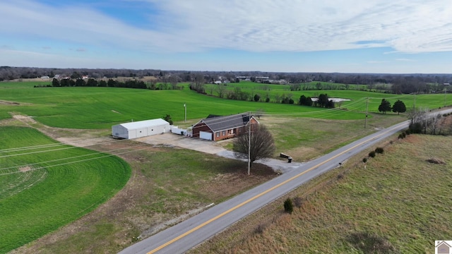 birds eye view of property featuring a rural view