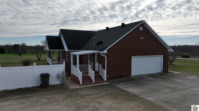 view of side of home with a garage