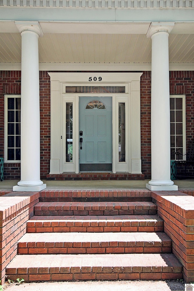 entrance to property with covered porch