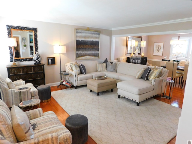 living room with wood-type flooring and crown molding