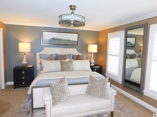 carpeted bedroom featuring multiple windows and crown molding