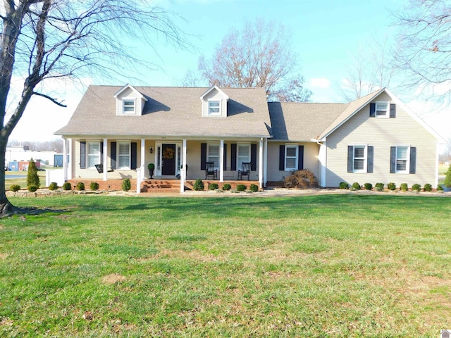 cape cod home with a porch and a front yard