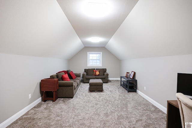 living room featuring carpet floors and lofted ceiling