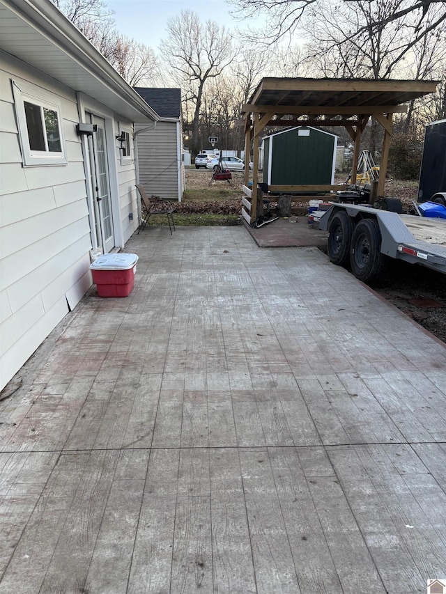 view of patio featuring a carport