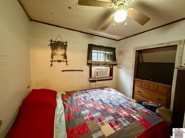 bedroom with ceiling fan, cooling unit, a textured ceiling, and ornamental molding