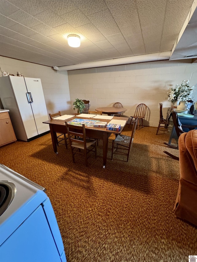 dining room featuring carpet