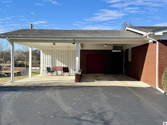 view of parking with a carport