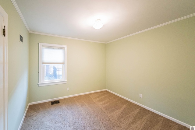 unfurnished room with carpet floors and ornamental molding