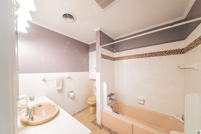 full bathroom featuring tile patterned flooring, tile walls, and ornamental molding