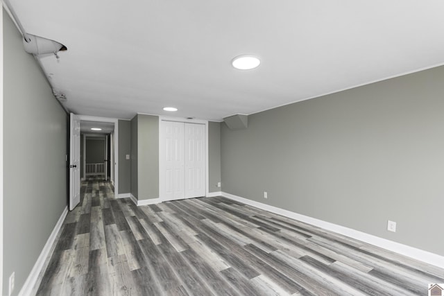 interior space with hardwood / wood-style floors and a closet