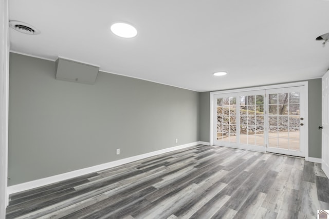 empty room featuring dark hardwood / wood-style flooring