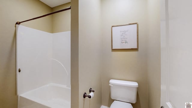 bathroom featuring  shower combination and toilet