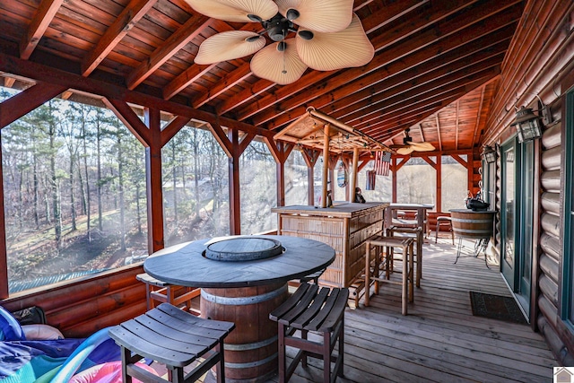 exterior space with wood ceiling, ceiling fan, lofted ceiling with beams, and a jacuzzi