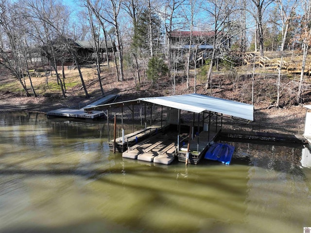 dock area featuring a water view