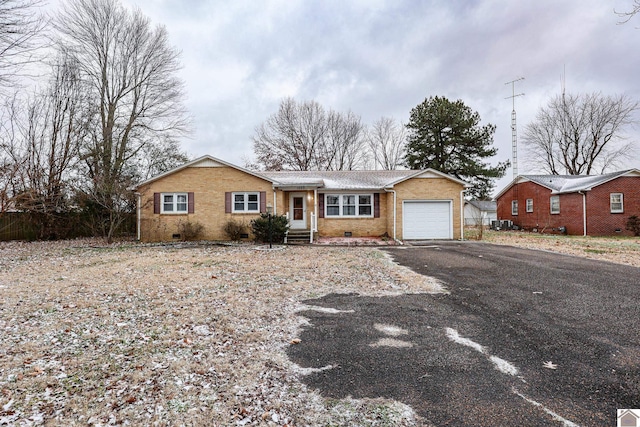 ranch-style house with a garage