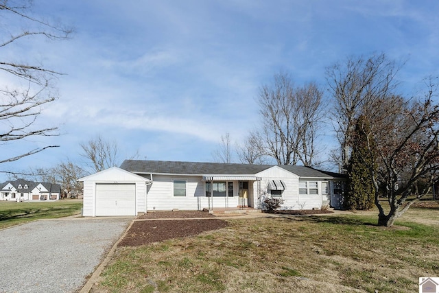 single story home with a front lawn and a garage