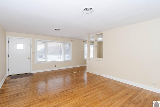 entrance foyer with light hardwood / wood-style floors