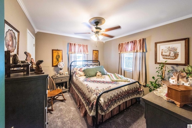 bedroom with ceiling fan, ornamental molding, carpet floors, and multiple windows