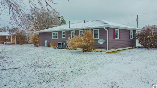 view of front of home with central air condition unit