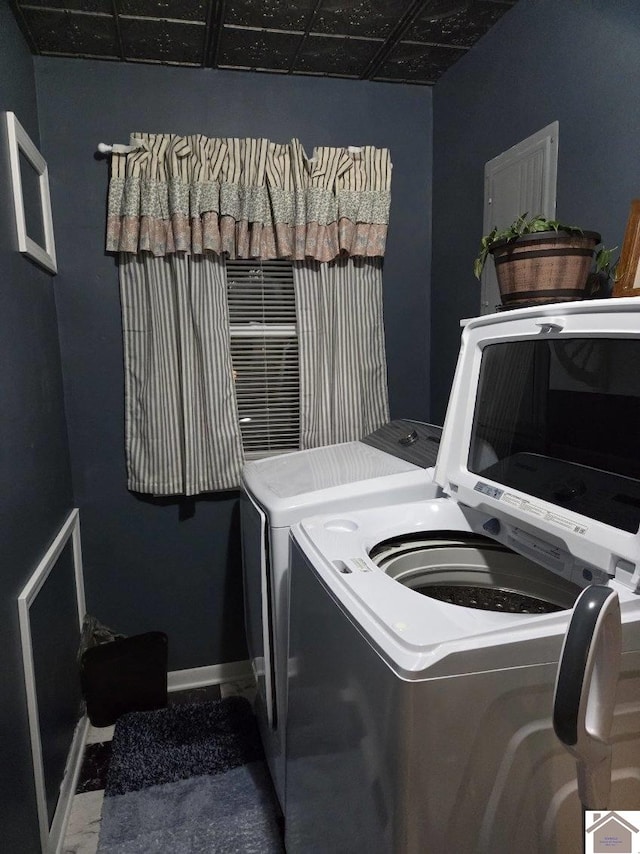 laundry area with washing machine and dryer